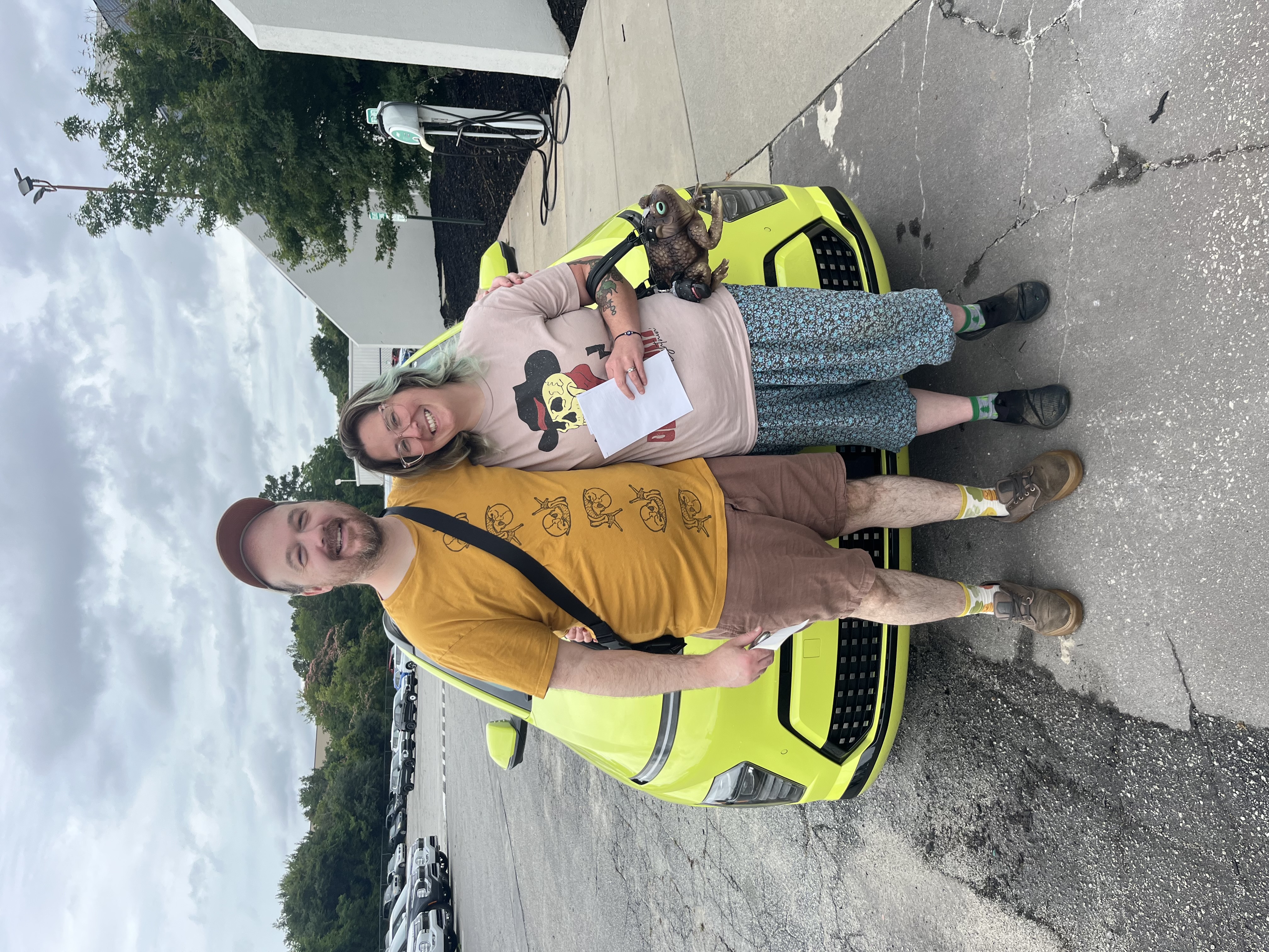 Customer with their new vehicle
